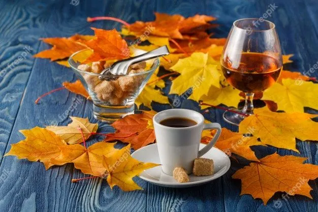 close-up-a-glass-of-cognac-and-coffee_155165-5477.webp