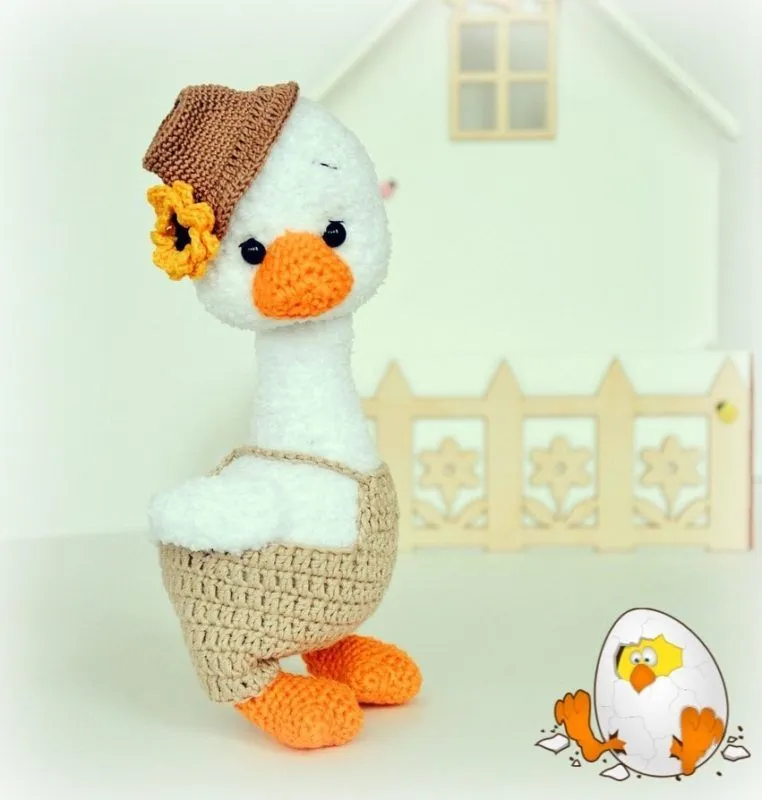 Vyazanyj-amigurumi-gus-krjuchkom-s-opisaniem-shemy-i-foto.webp