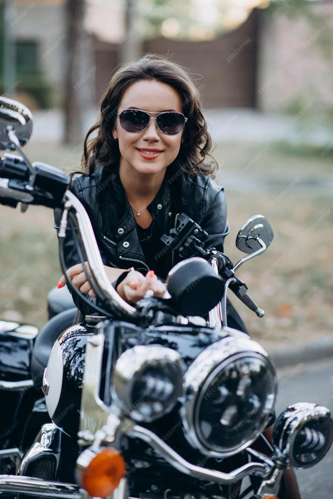 young-beautiful-biker-girl-glasses-leather-jacket-motorcycle-concept-speed-freedom_182920-823.webp